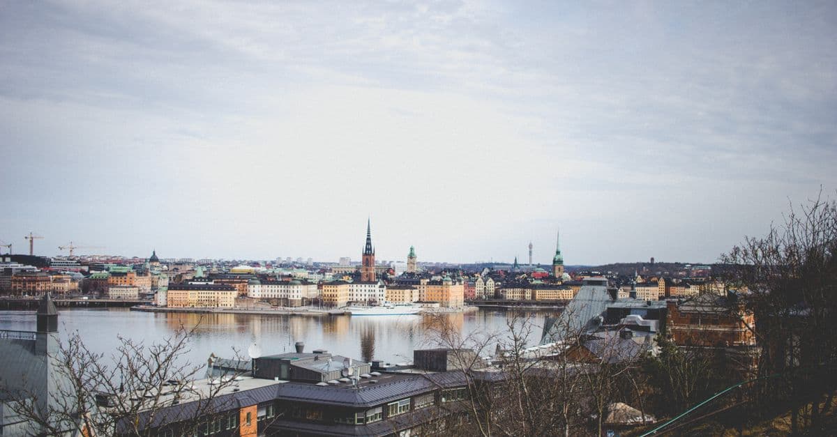 Stockholm old town and church spires across the water under a grey sky
