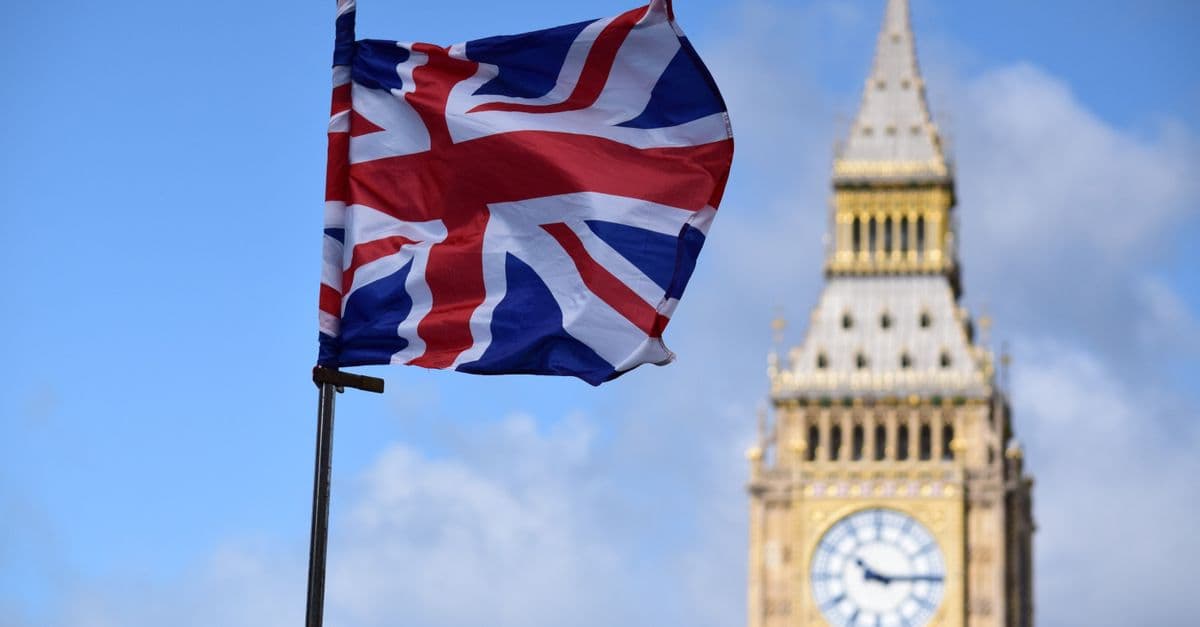 Union Jack flag in front of the Elizabeth Tower in London