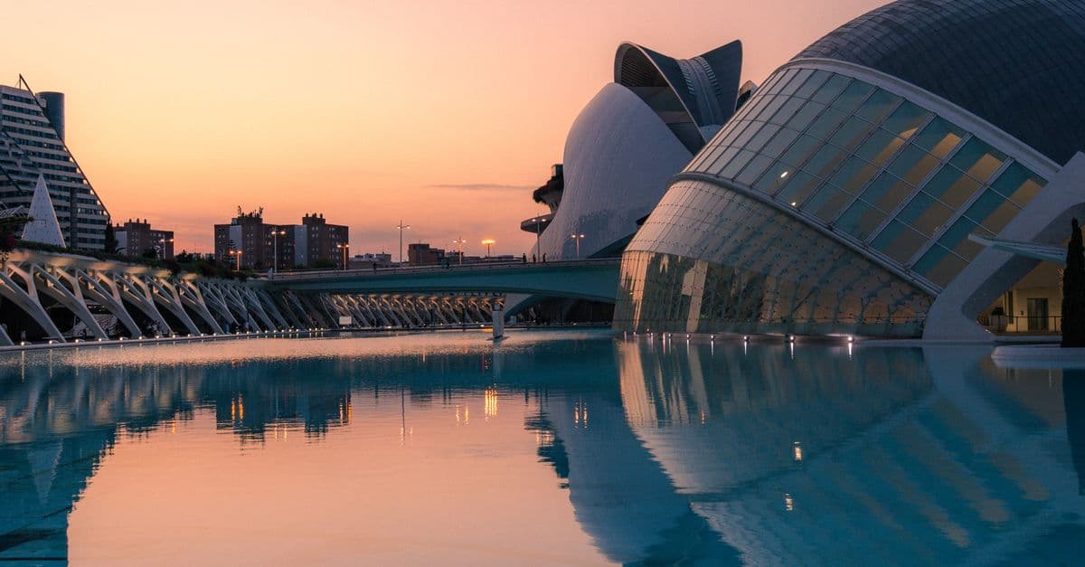 City of Arts and Sciences in Valencia reflected in the water at sunset